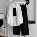 White Button-Down Shirt With Black Ribbed Knit Tank Top & Black Flapper Trouser
